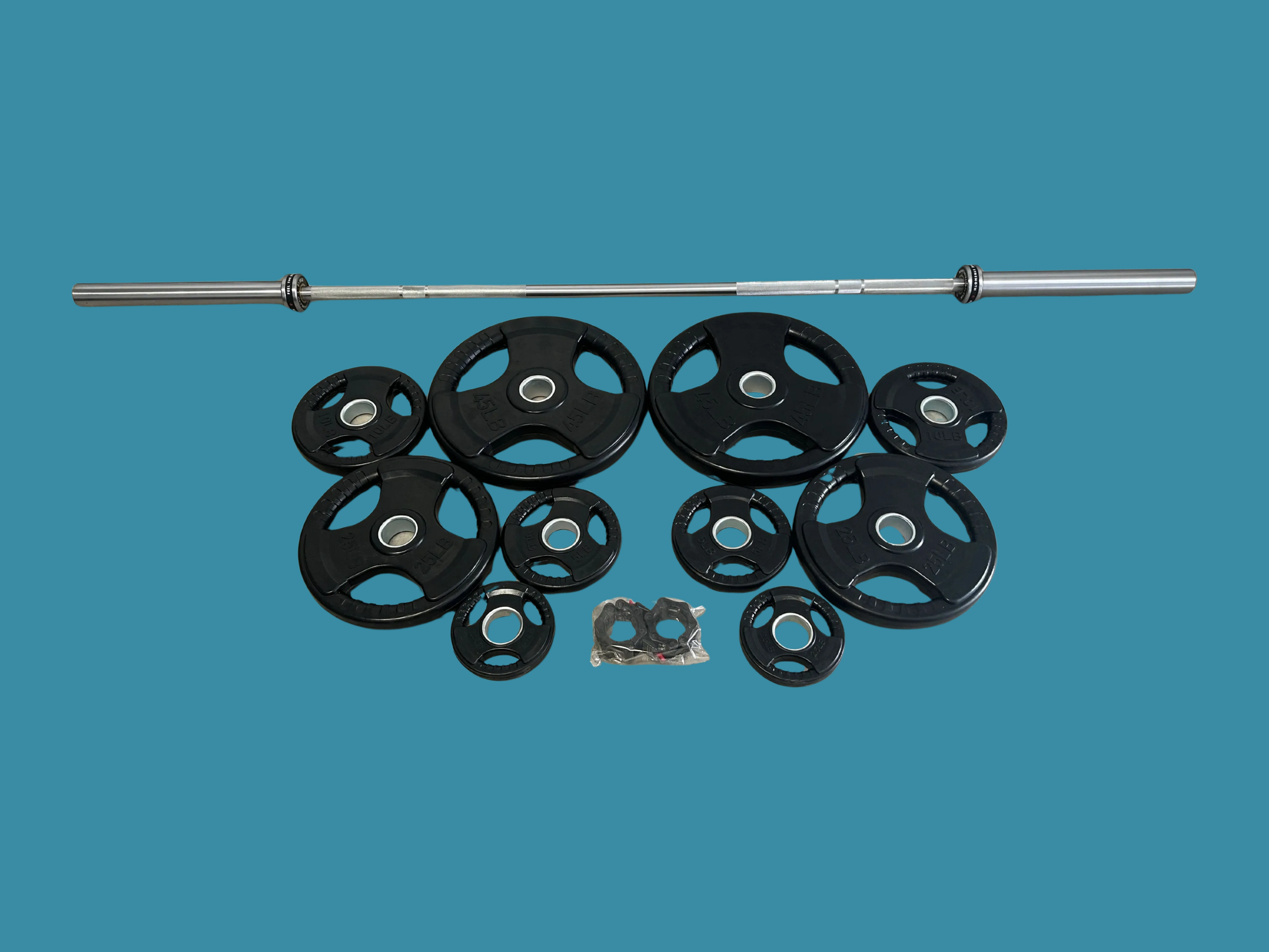 Ensemble neuf incluant barre olympique polyvalente Atlantis + 175lbs de plaques Tri Grip Classiques et collets à verrouillage hexagonal