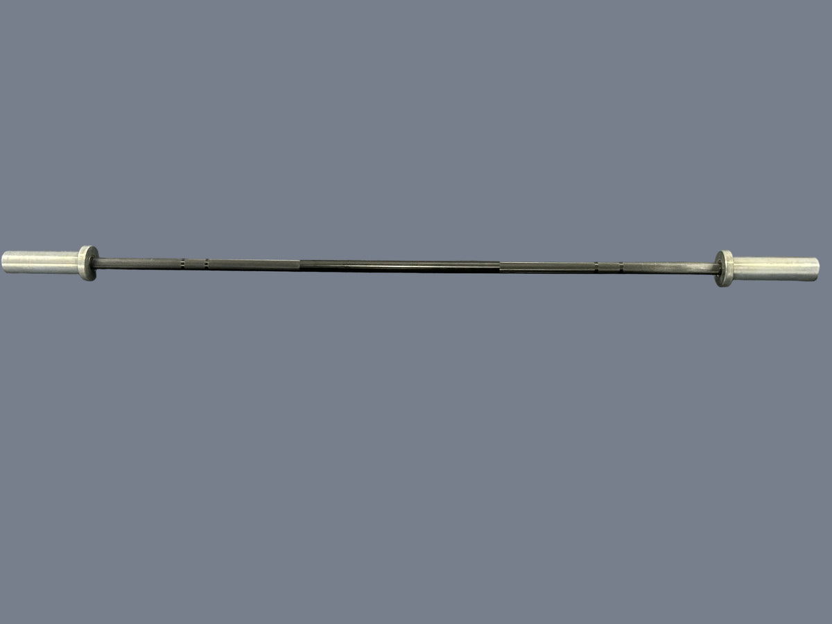 Barre technique de 22lbs/10 kg ROGUE rackable et comme neuve